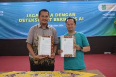 Penandatanganan MOA Fakultas oleh Dekan FTKI, Dr. Agung Triayudi, S.Kom., M.Kom. pada acara Campus Security Day di Aula Blok 1 Lt. 4 UNAS pada Kamis (3/10).